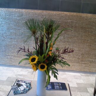 Tropical sensation in a tall white vase